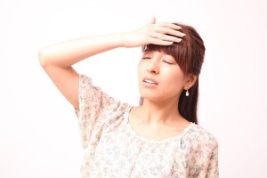 めまいがする女性
